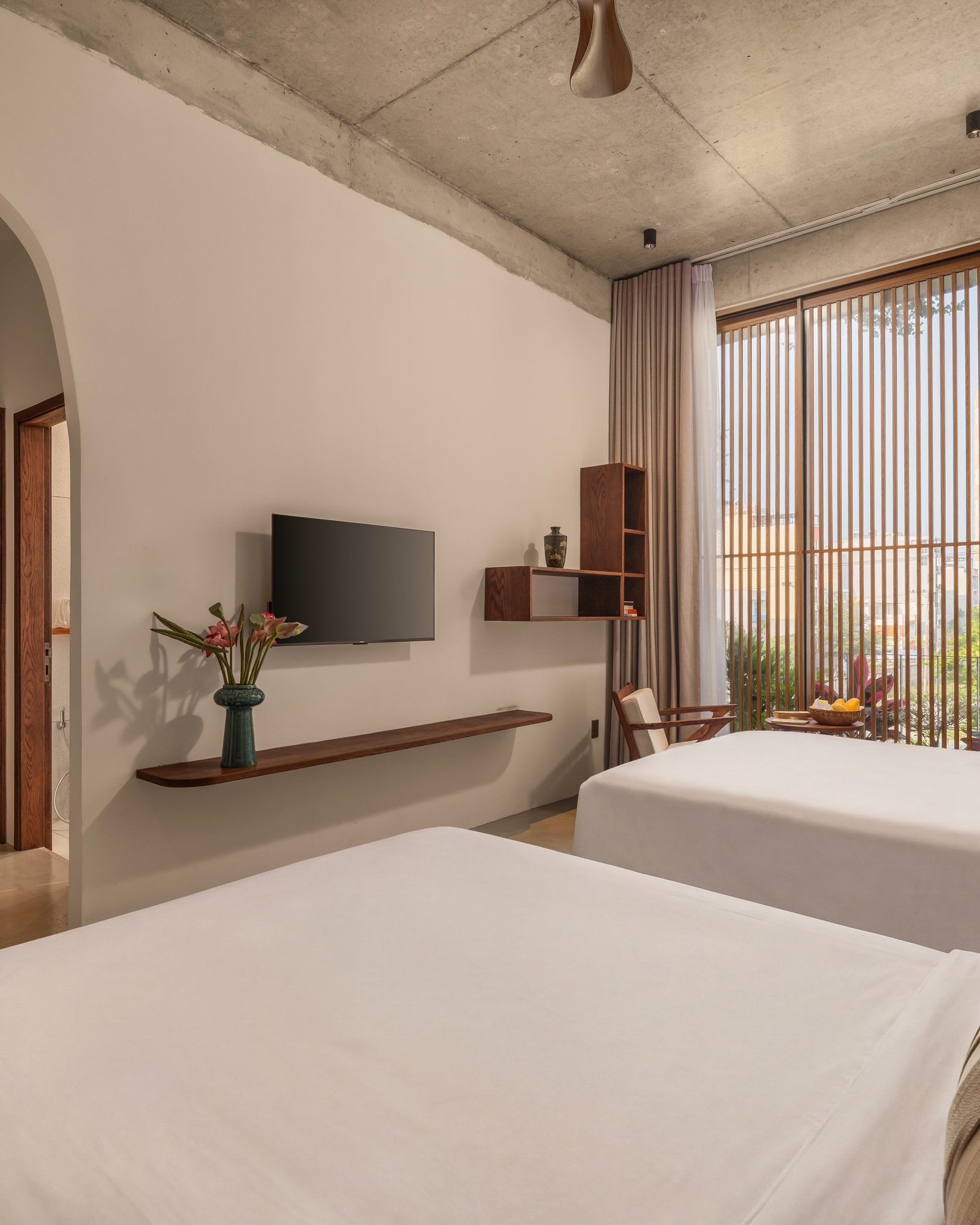 Bedroom with arched window
